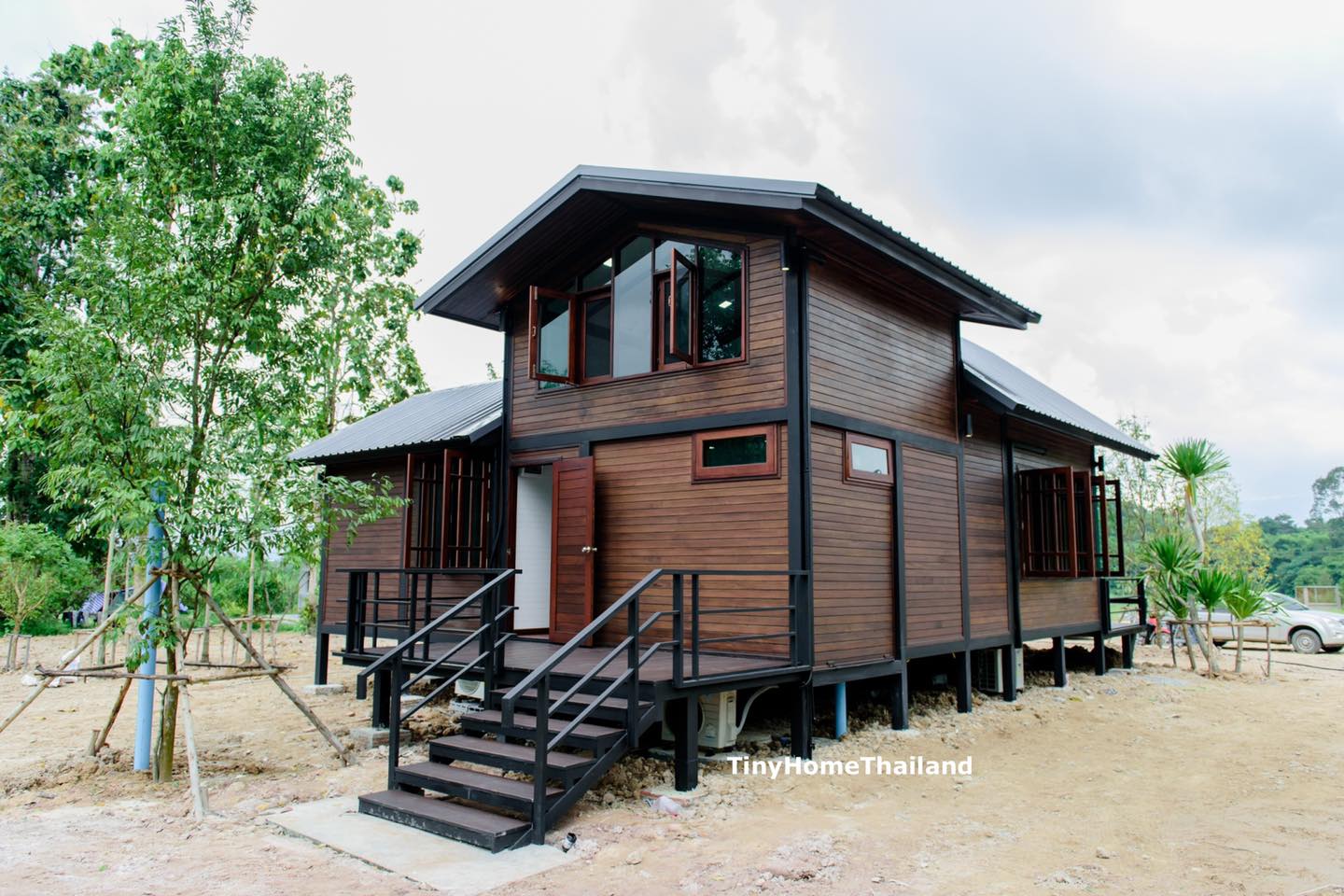 Nordic Style Wooden House With Spacious Deck Surrounded by Nature