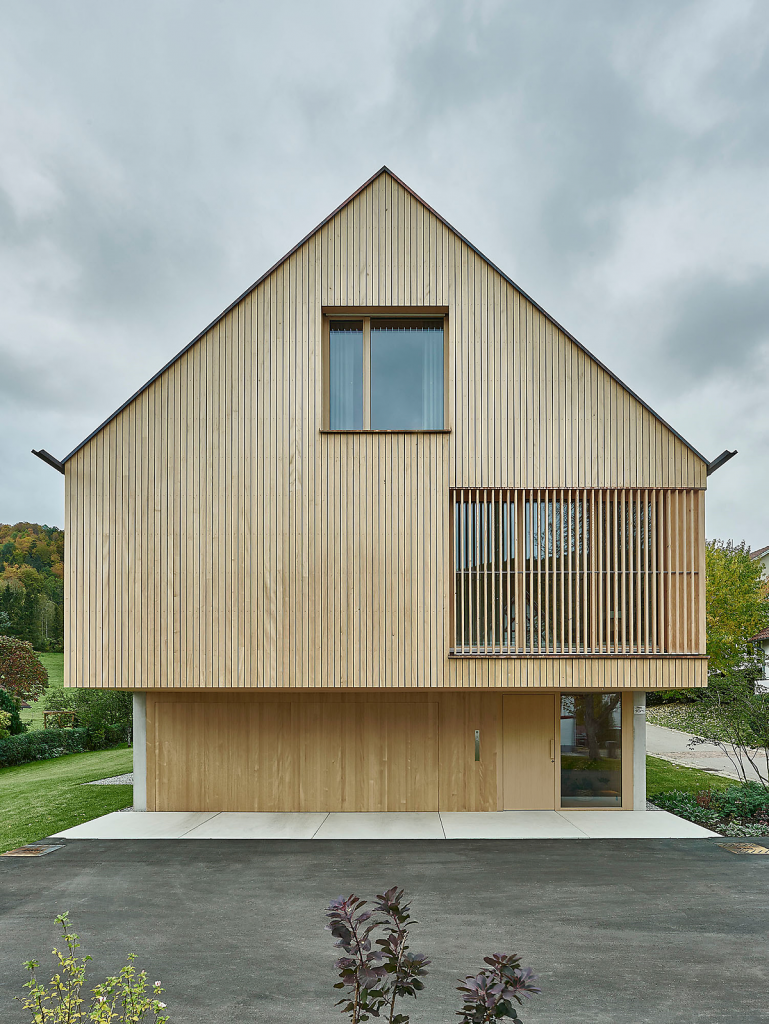 Wooden Gable Roof House. Concrete Mix Structure. Rustic Vibe - Minimal ...